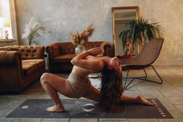 Photo by KoolShooters  : https://www.pexels.com/photo/woman-in-white-tank-top-lying-on-floor-6246587/
